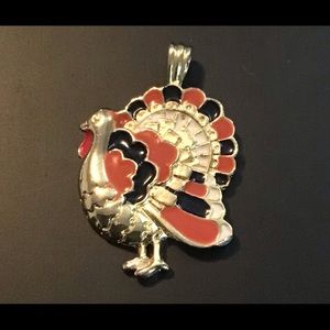 Gold tone with orange and black colors Turkey pendant